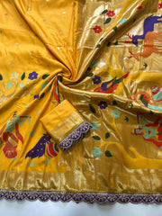 Banarasi silk with intricate golden zari weaving